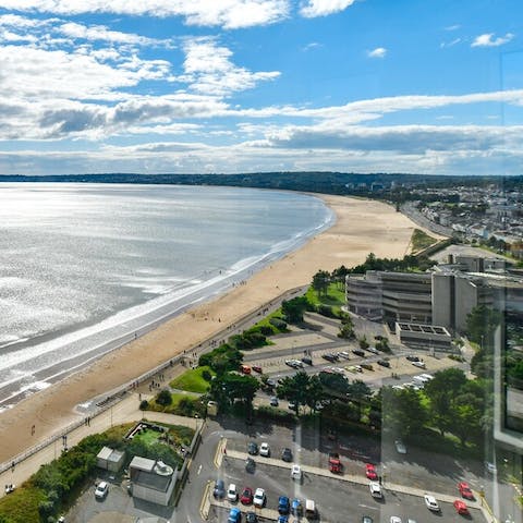 Spend your days at the sandy beach, views of which you have from the apartment – it's just a five-minute walk away