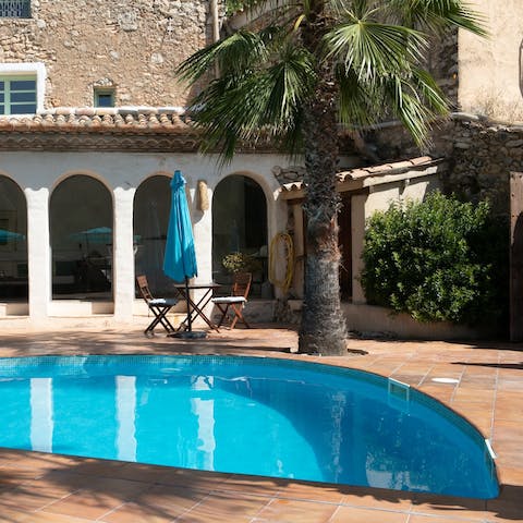 Enjoy a refreshing dip in the shared pool and lounge poolside in the sun