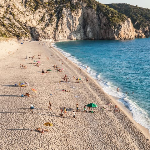 Spend the day on gorgeous Agios Ioannis Beach, a fourteen-minute drive from home