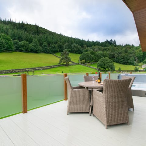 Enjoy alfresco dining as you take in views of the nearby woodlands