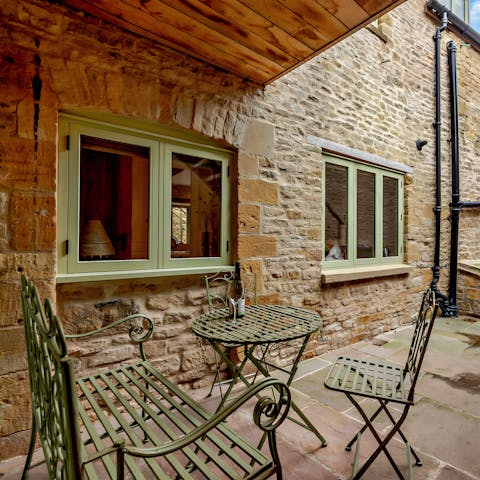 Sit out with a cup of tea on the private patio with bistro seating
