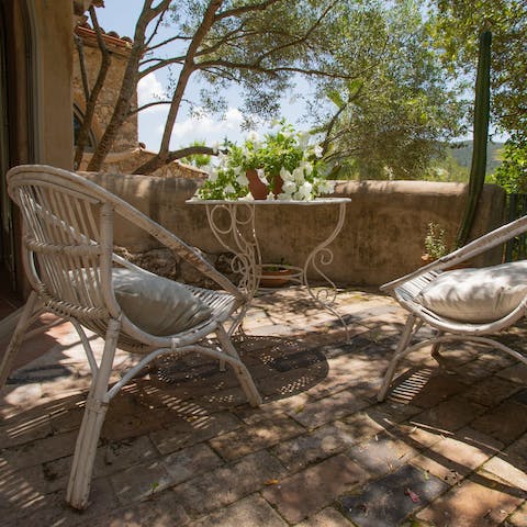 Relax with a glass of cava on the shaded terrace