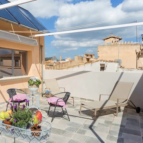 Bask in the Mallorcan sun on the roof terrace and take in the views over Llucmajor's rooftops  