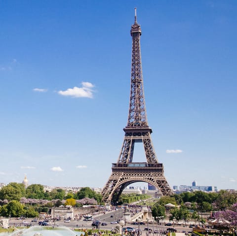 Make your way over to the Champ de Mars and admire the Eiffel Tower
