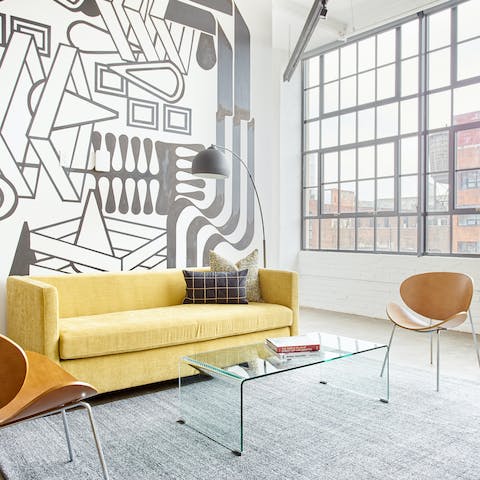 Kick back in your arty living room while admiring Callowhill views from the Crittal windows