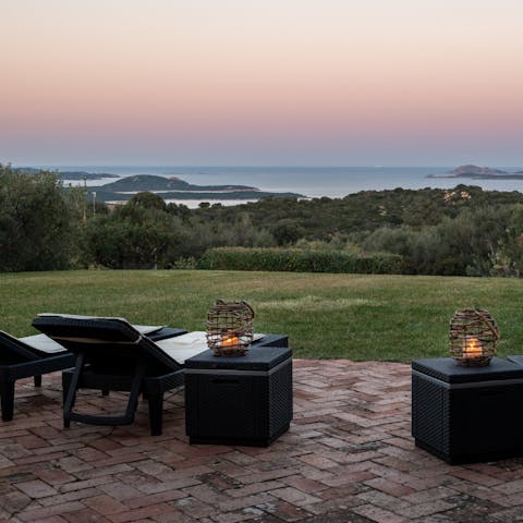 Stretch out on the loungers to watch the sun set across Soffi and Mortorio islands