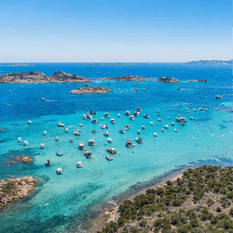 Explore the stunning coastline of Costa Smeralda with its crystal-clear waters