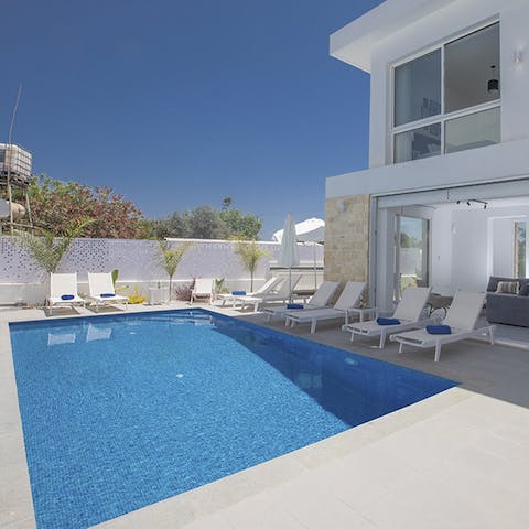 Escape the heat with a dip in the private pool or work on your tan on the sun loungers