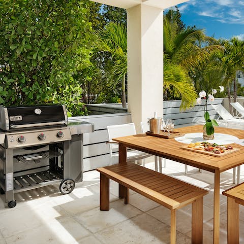 Light the barbecue and enjoy an alfresco meal, poolside