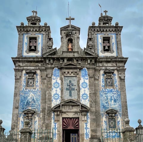 Visit the beautiful Igreja de Santo Ildefonso, a three-minute walk away