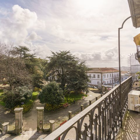 Take in views of the Jardim Marques de Oliveira from the second bedroom's Juliet balcony
