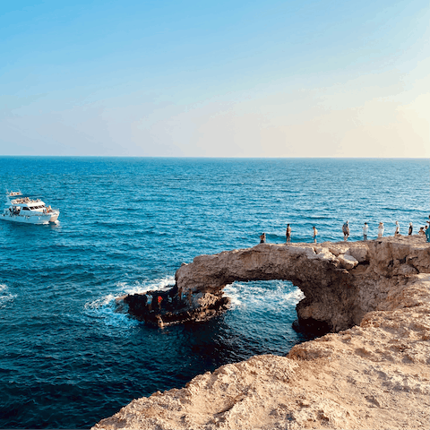 Visit the Love Bridge, as you'll be staying only a few kilometers from central Aiya Napa