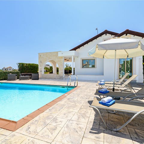 Imagine yourself lazing around this pool and soaking up the Cyprian sunshine here