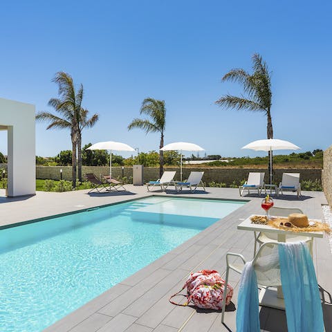 Escape the heat in the private pool or relax poolside with a drink and soak up the sun