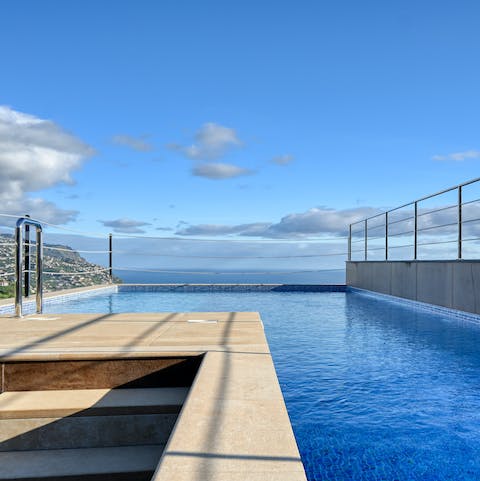 Swim some laps in the private rooftop pool surrounded by breathtaking views