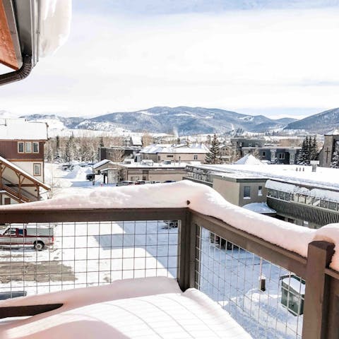 Equip yourself with a hot chocolate on the balcony for mountain views