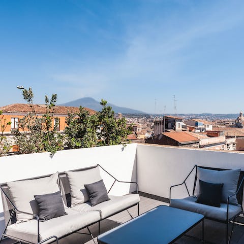 Take in the stunning views of Mount Etna from the roof terrace