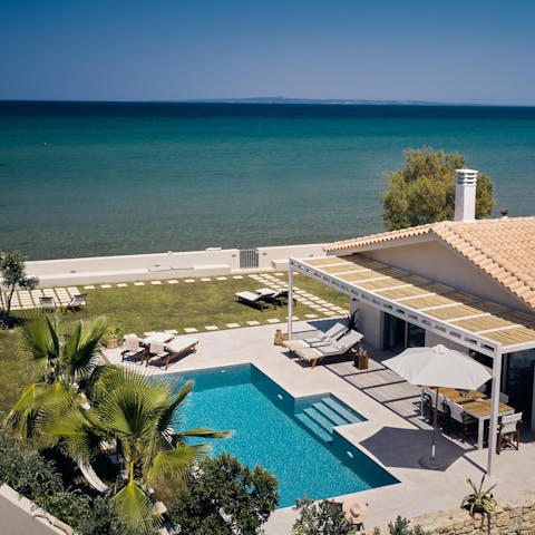 Stay with the glistening Ionian waters lapping at the property's edge