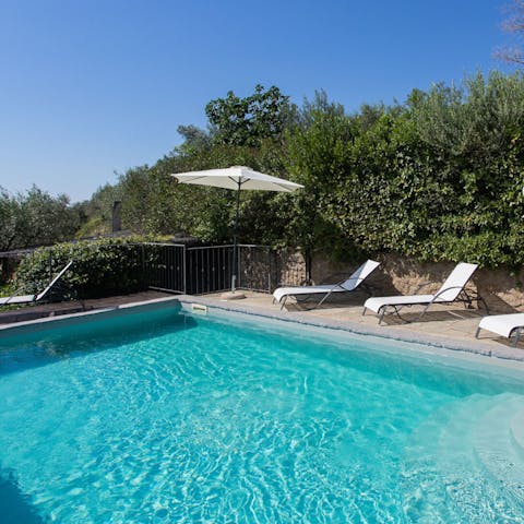 While away summer afternoons by the pool, splashing in the water and stretching out on the lounge chairs