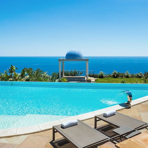 Do your laps in the private pool while taking in the views of the Ionian Sea
