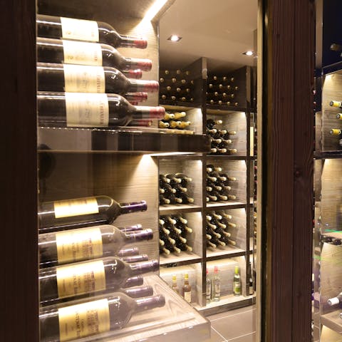 Explore the wine selection in the small cellar 