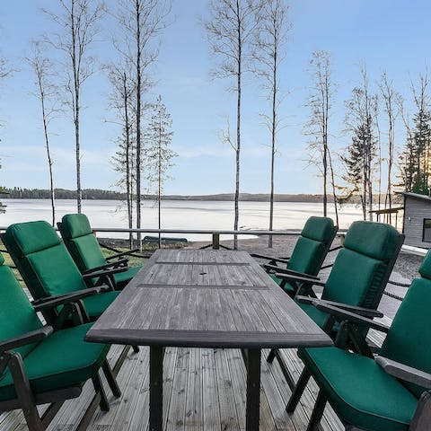 Dine outside, overlooking the lake's peaceful shores
