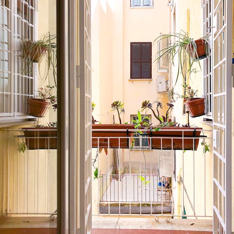 Perch on your standing balcony with a cup of coffee