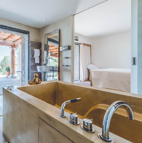 End the day with a soak in the stone bathtub