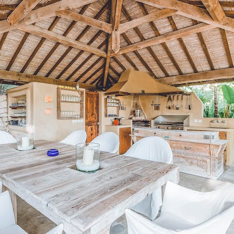 Cook up a rustic alfresco feast in the summer kitchen in the shade