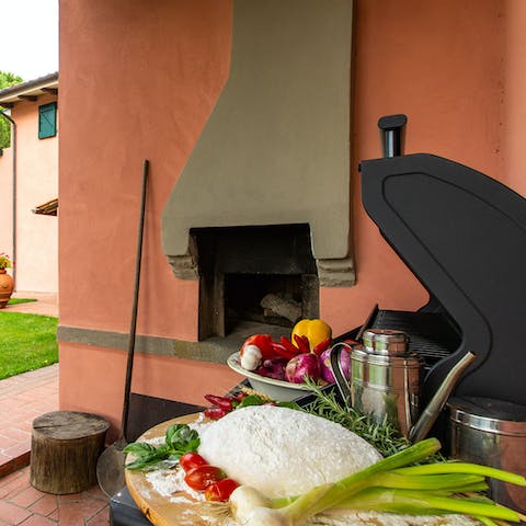 Make the most of the owner’s bountiful organic vegetable garden and use the outdoor wood-fired pizza oven or gas grill