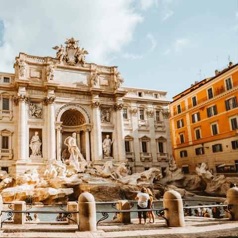 Toss a coin in the Trevi Fountain, only eight minutes from home