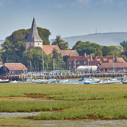 Watch the boats pootle to and from the Bosham Quay, a five-minute walk away 