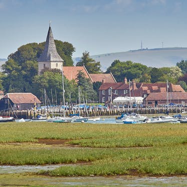 Watch the boats pootle to and from the Bosham Quay, a five-minute walk away