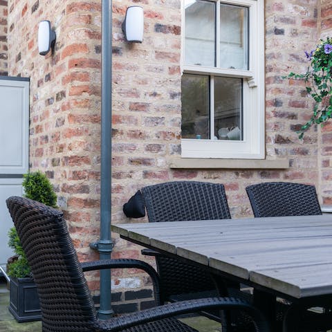 Open up a bottle of something chilled and enjoy out in the home's courtyard