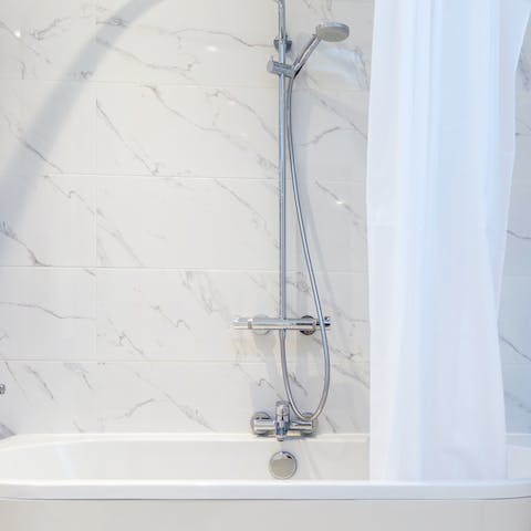 End the day with a relaxing soak in the elegant freestanding bathtub