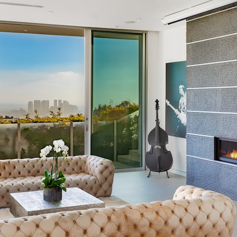 Admire the skyline views from the glass-walled living area