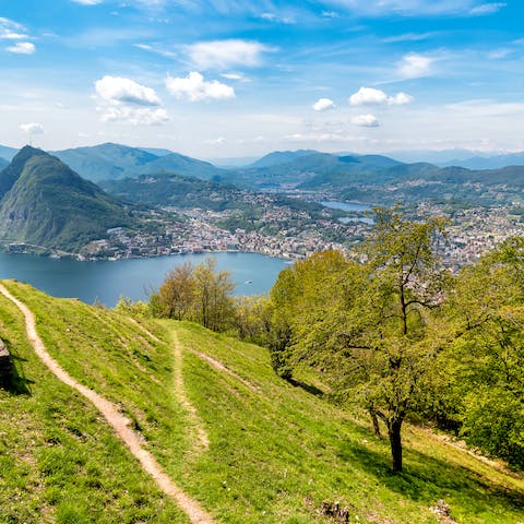 Explore the stunning landscapes of Lake Lugano from your location in Paradiso