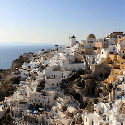 Explore the beautiful sights and sounds of Oia by foot