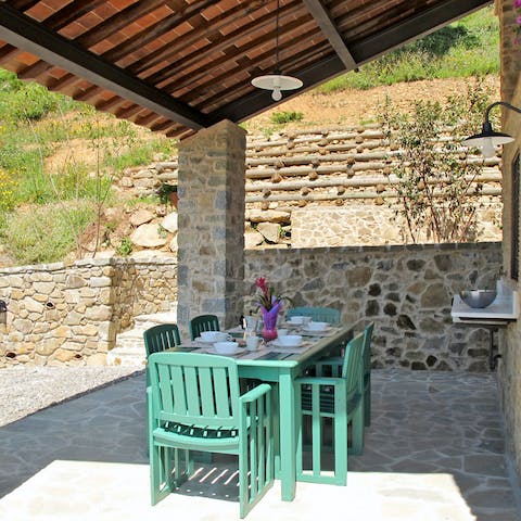 Dine alfresco on the sun-dappled terrace