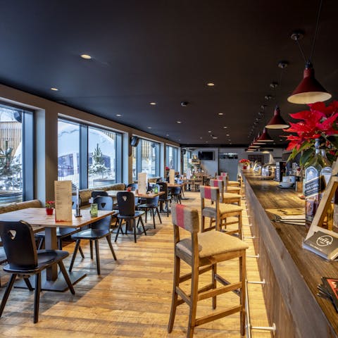 Enjoy aprés-ski vibes in the bistro downstairs