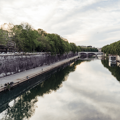 Make early evening strolls along the Tiber River part of your new everyday (a four-minute stroll away)