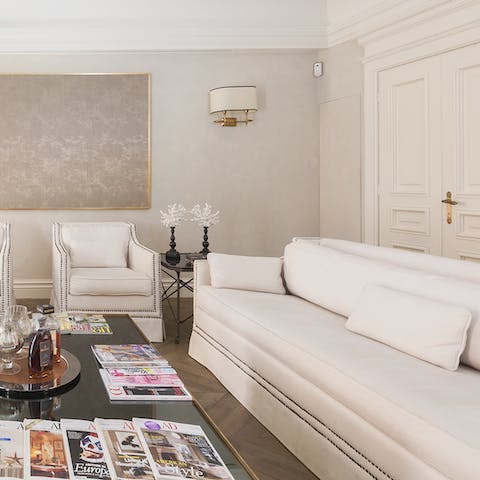 Relax in the plush living room after a busy day exploring Rome