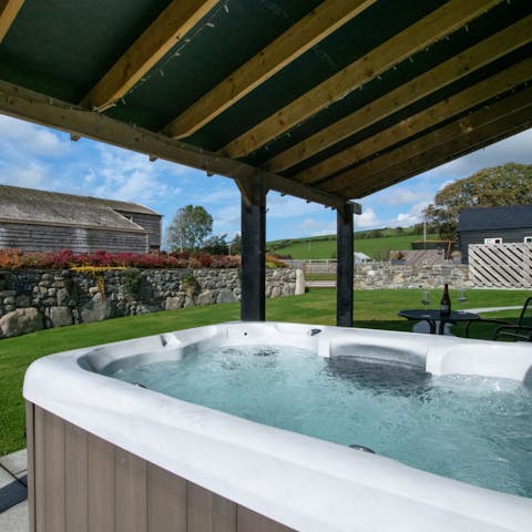 End the day with a long soak in the covered hot tub