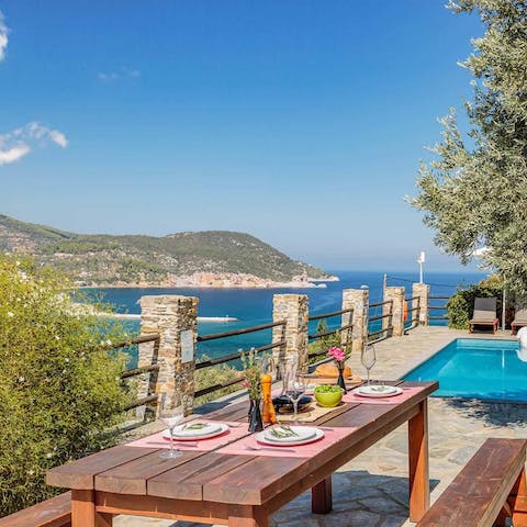 Savour a barbecue feast on the terrace, with a backdrop of the Aegean