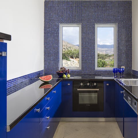 The mosaic style open-plan kitchen
