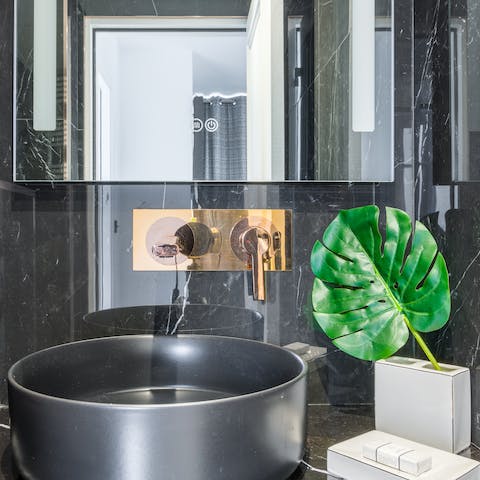 Pamper yourself in the marble-clad bathrooms before setting out for a fashionable night out on the town