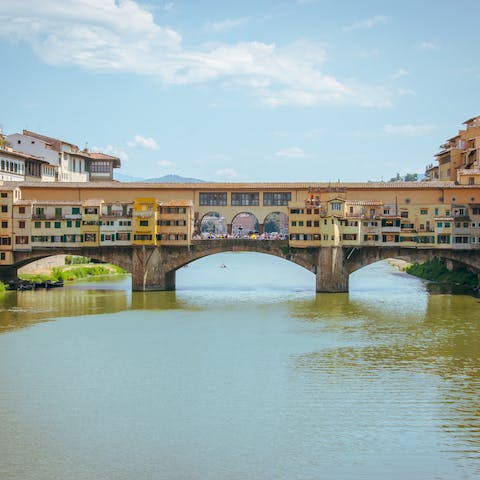 Stroll along the Ponte Vecchio, a four-minute walk from your doorstep 