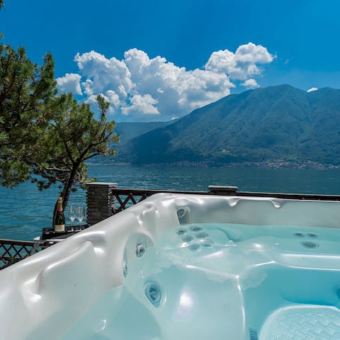 Sip something bubbly in the hot tub and enjoy the view