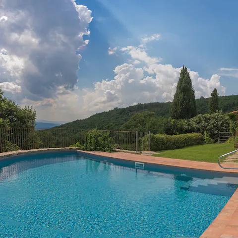 Swim in the glorious corner pool, overlooking the Tuscan hills