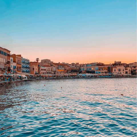 Drive twenty minutes to Chania for dinner beside the sea